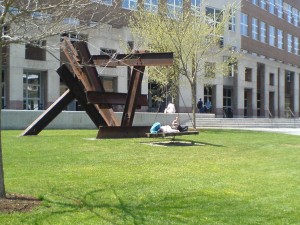 Bystanders are allowed to climb on the sculpture. Are they allowed to sleep on it? Mark di Suvero, American, born 1933. X-Delta 1970 Iron, steel, wood. Darmouth College, Hanover, NH. Picture by Roberto Casati, May 2014.